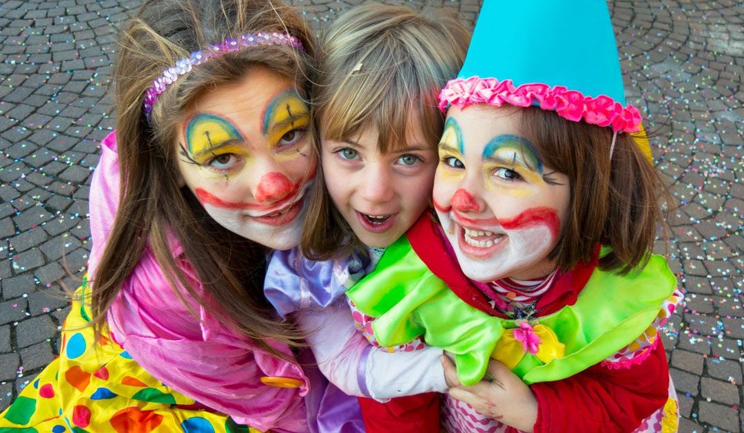 Three Nice Italian Children With Dresses And Makeup For Carnival